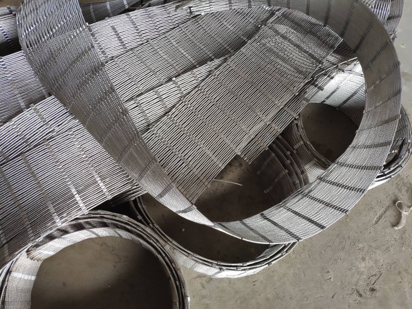 Finished mesh panels — rolled