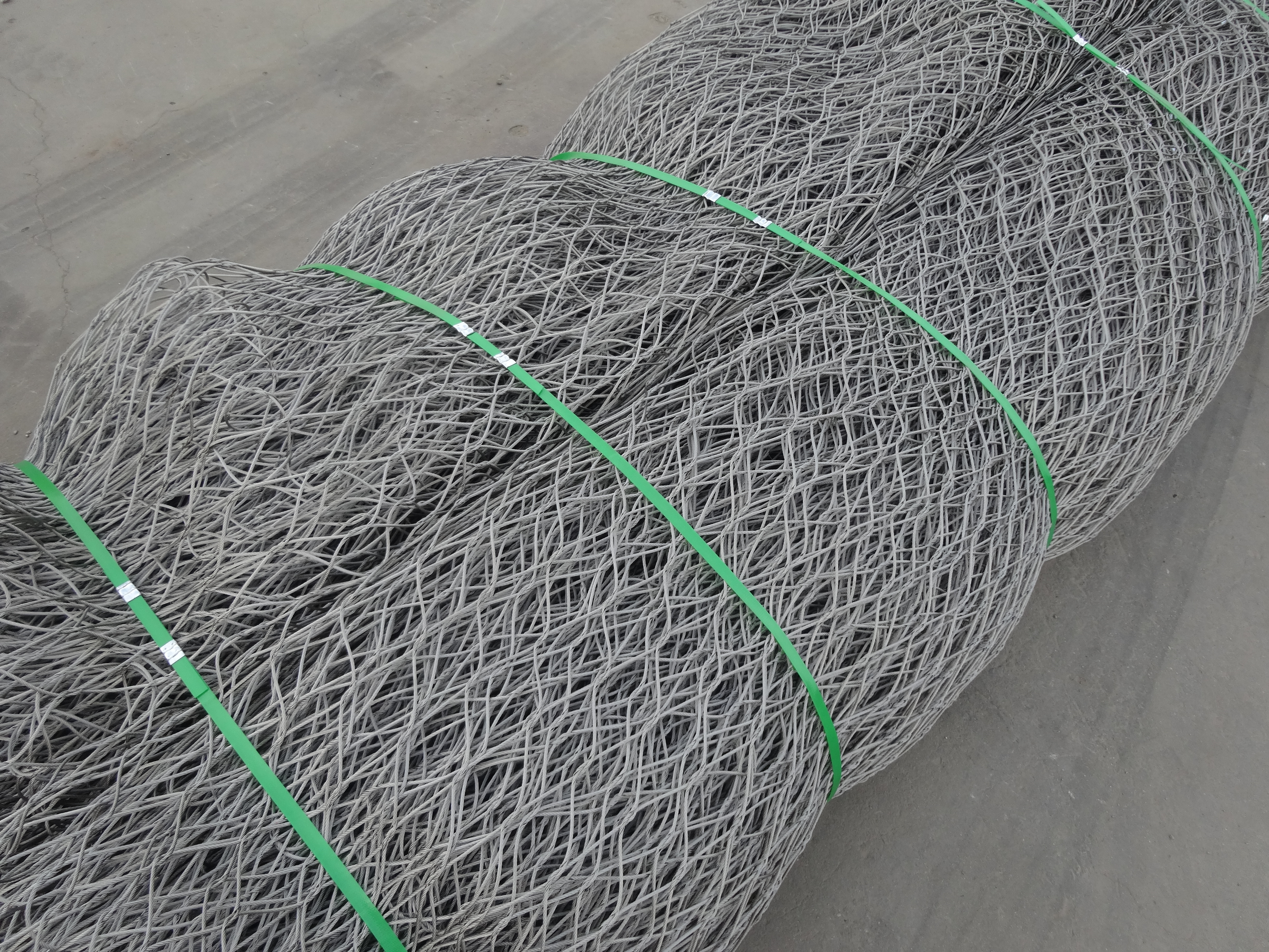 Knotted rope net knot detail — hand-locked node